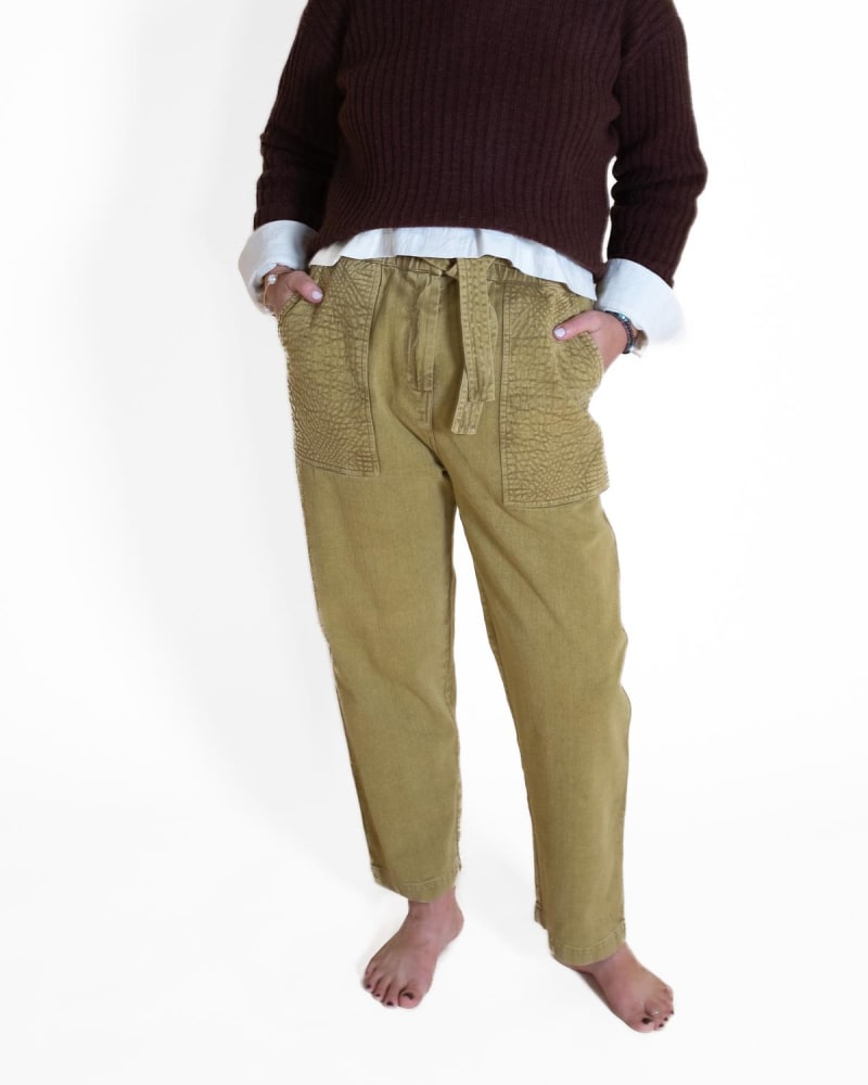 Front of a model wearing a size L Arlove Pants in Camel in Camel by Louise Misha. | dia_product_style_image_id:332444